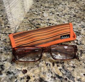 6.00-tangerine-757 Calabria 757 Reading Glasses With Striped Designs And Matching Case In Tangerine 6.00