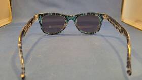 Foster Grant 887661125118 Sunglasses Clear Glass Zebra Print With Teal Clip On Front