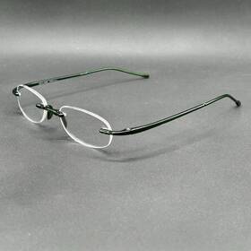 8499-122624-22.95 Scojo New York Gels 73615 Rimless 1.50 Reading Glasses Jade Green Used