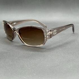 8713-011425-19.95 Sun Readers Oleg Cassini Cars201 278 250 Bifocal Light Brown Crystal Used 2.50
