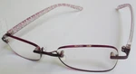 Reading Glasses 1.25 Foster Grant 52 18 138 PD64 Purple Rimless. Fixed Price $9.69.