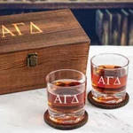 Alpha Gamma Delta Engraved Whiskey Glasses In Wood Gift Box. Fixed Price $69.99.