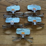 Foster Grant Alumineyes Gun Metal 1.75 Reading Glasses Readers Frameless. Fixed Price $49.99.