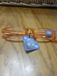 Reading Glasses Orange. Fixed Price $30.88.