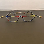 Ladies Reading Glasses 2.50 Abstract Design With Chain Case. Fixed Price $25.00.