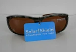 Foster Grant Solar Shield Polarized Sunglasses Fits Over Reading Glasses, Large. Fixed Price $8.99.