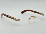 Premiere Cartier Decor Wood Rimless Eyeglasses New Genuine CT0377O Rp $3350. Fixed Price $1950.00.