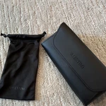 Valentino Black Leather Hard Case And Pouch For Sunglasses. Fixed Price $20.00.