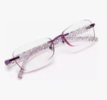 Magnivision Women's Rimless Readers Daniella +1.25 Purple Reading Eyeglasses. Fixed Price $19.99.
