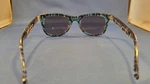 Foster Grant Sunglasses Clear Zebra Print With Teal Clip Front. Fixed Price $19.99.