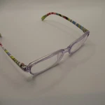 Nannini Reading Glasses Purple Rectangular Frame Multicolor Striped Temples. Fixed Price $26.86.
