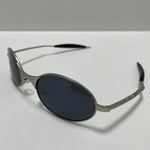 Oakley Wire Polarized Sunglasses Titanium Sliver Frame Black Lenses. Fixed Price $125.00.
