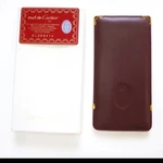 Catier Glasses Case Women's Must-line Bordeaux Gold Leather. Fixed Price $250.00.