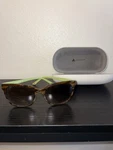 Liz Claiborne Sunglasses Brown Frame Tinted Lenses And Green Temples. Fixed Price $20.00.