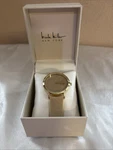 Nicole Miller Women's Watch Never Removed From Box Light Pink Face & Band. Fixed Price $21.00.