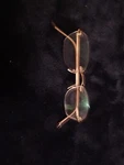 Frameless Titanium Alloy Anti Blue Reading Glasses Flexible For Reader Gold. Fixed Price $20.00.