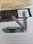 Case Xx 6207 Caribbean Blue Bone Mini Trapper With Us Flag Design Of 500 CA125. Fixed Price $106.00.