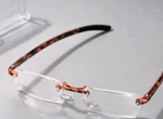 New Stowngo Readers +1.50 Reading Glasses - Amber Tortoise Clear Protective Case. Fixed Price $8.99.