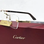 Cartier CT0411O 003 Rimless White Buffalo Horn Gold Clear 57MM. Fixed Price $2222.00.
