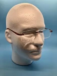 Design Optics PD62 51 18/138 +3 Rimless Coral Rectangular Reading Glasses. Fixed Price $9.99.