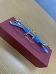 New Cartier CT0453O003 Rimless Eyeglasses Gold Red Wood Temples Clear Lens 56MM. Fixed Price $1800.00.