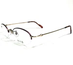Aston Martin AM-15 Eyeglasses Frames Purple Gold Round Half Rim 50-21-140. Fixed Price $74.49.