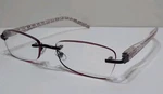 Foster Grant Rimless Reading Glasses +1.50 Purple Pattern 52-18-138. Fixed Price $9.67.