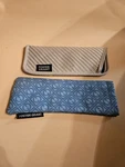 2 Women's Foster Grant Soft Sleeve Protective Case And Glass Cloth. Fixed Price $8.91.