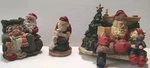 3 Santas Stocking Hanger,reading Little BOY,(1) W/ Girl Pet. Fixed Price $50.00.