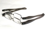 Lot Of 2 Foster Grant On The Go, Black +1.50 Folding Readers W/ Pivoting Temples. Fixed Price $17.97.